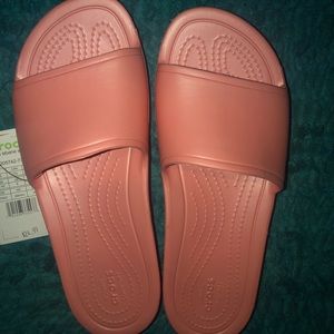 Peach croc slides